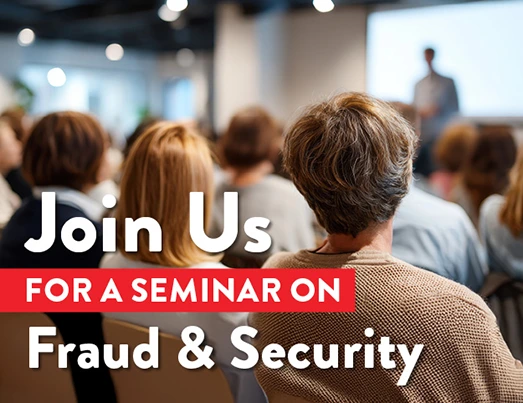 Room full of people attending a seminar: Join Us for a seminar on Fraud & Security