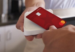 credit card tapped at sales portal