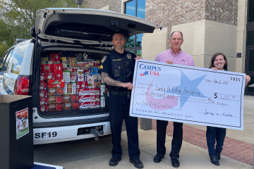 CAMPUS making a donation to Sante Fe Police Foundation