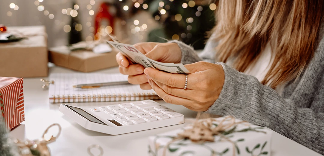 Woman budgeting her holiday shopping