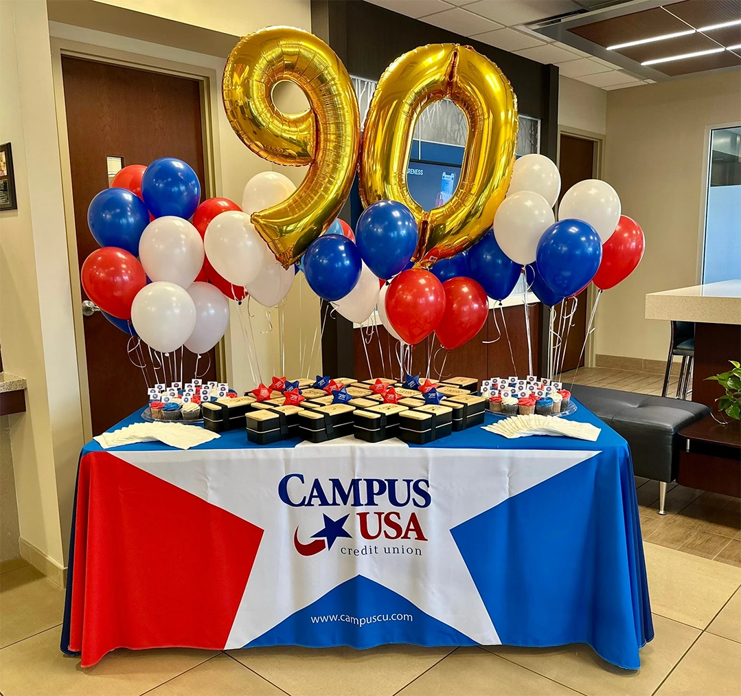 Table display for CAMPUS USA Credit Union 90th birthday celebration